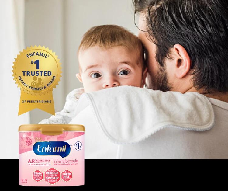 Dad burping baby