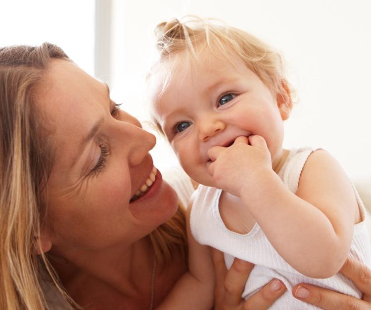Mom looking lovingly at toddler